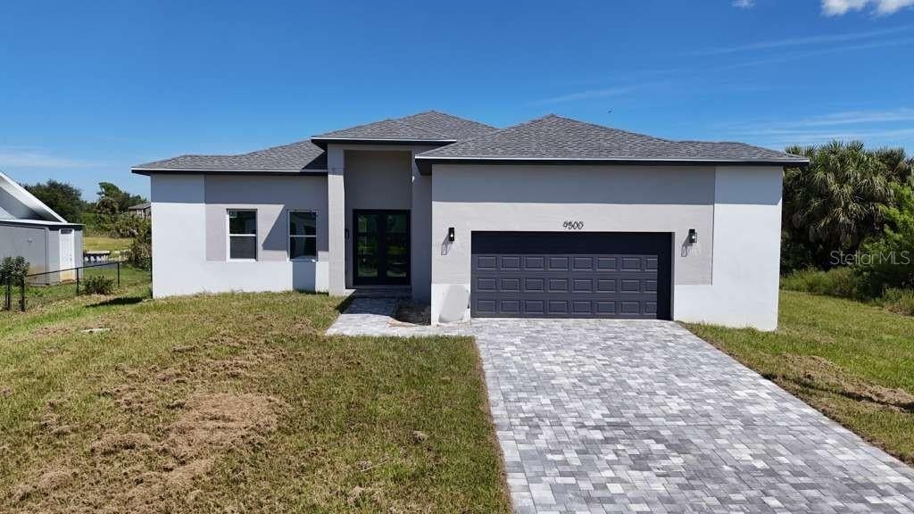 Photo of 9500 Galaxie Circle, Port Charlotte, FL 33981 (MLS # O6423006)