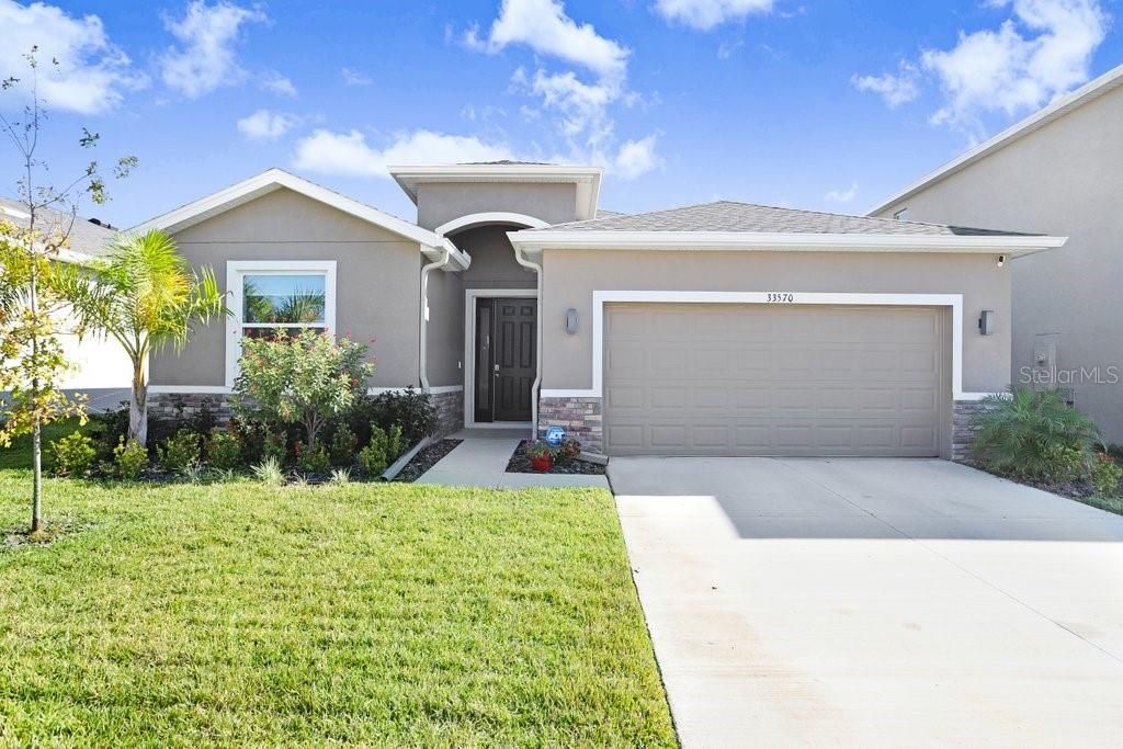 Photo of 33570 Darley Dale Trail, Wesley Chapel, FL 33545 (MLS # TB8451111)