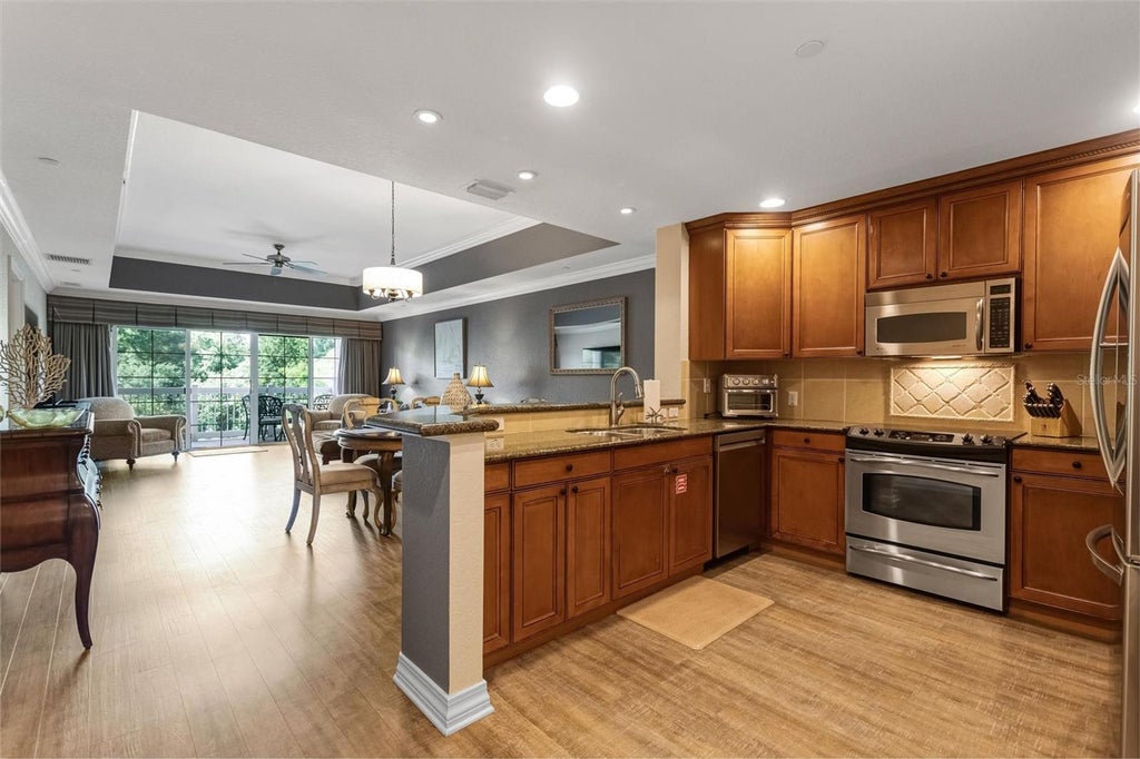 Photo of 7656 Whisper Way #402, Kissimmee, FL 34747 (MLS # S5159647)