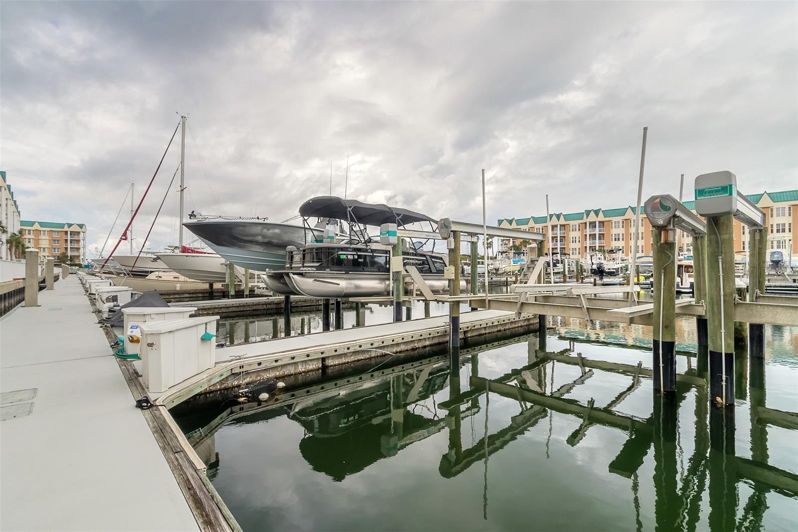 This is a 42 ft. slip with a 27,000 lb lift. Must own Condo in Harbour Village to purchase a boat slip. ;3rd Party Gr Com Reqd