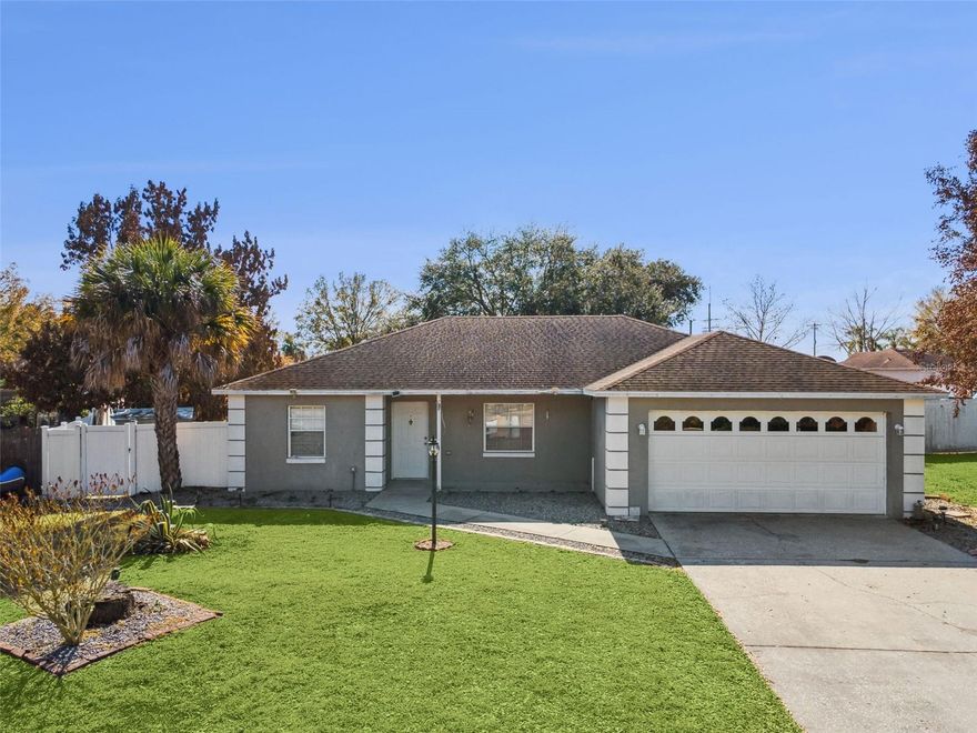 Fantastic opportunity to own this beautiful 3-bedroom, 2-bath home with a 2-car garage, Huge fully fenced backyard, and NO HOA!!! Move-in ready, this home offers both comfort and style. Step inside to find modern tile flooring throughout and an updated kitchen featuring solid wood cabinets, ample counter space, stainless steel appliances, and an open layout that flows seamlessly into the living room area, perfect for entertaining and everyday living. The split-bedroom floor plan provides privacy for everyone. The spacious Master bedroom includes a walk-in closet and a private master bath. Step outside to your covered lanai — the perfect spot to relax while enjoying beautiful sunsets and panoramic backyard views. It is conveniently located just minutes from downtown Auburndale with quick access to I-4, for an easy commute to both Orlando and Tampa areas. A must-see property! All measurements, sizes, and information are deemed reliable but should be independently verified. Schedule your private showing today.