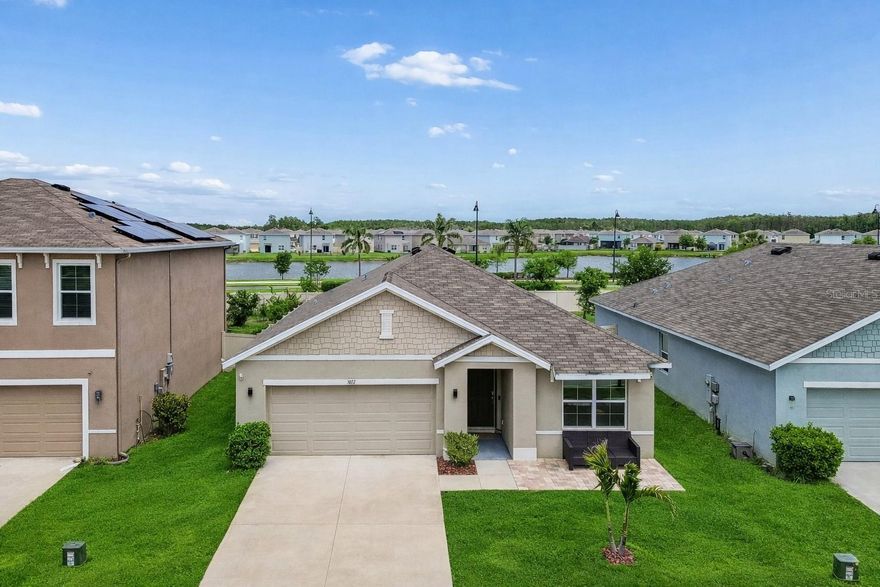 Welcome to 3012 Pink Peacock Lane in Odessa, Florida. This newer construction, single story home is ideally situated at the end of a quiet street within a desirable preserve community, offering a peaceful setting with natural surroundings and added privacy. Featuring 3 bedrooms, 2 bathrooms, and a functional split floor plan, the home offers an open-concept layout with tall ceilings and abundant natural light. The kitchen is equipped with granite countertops, a large island, pantry, and upgraded lighting, flowing seamlessly into the living and dining areas. The private primary suite includes a walk-in closet, dual vanities, and a walk-in shower. Enjoy outdoor living in the fully fenced, oversized backyard with an extended paver patio and screened lanai. Conveniently located near top rated schools, shopping, dining, and major roadways for easy commuting. Schedule your private showing today! (A/C, W/H, and Roof 2021)