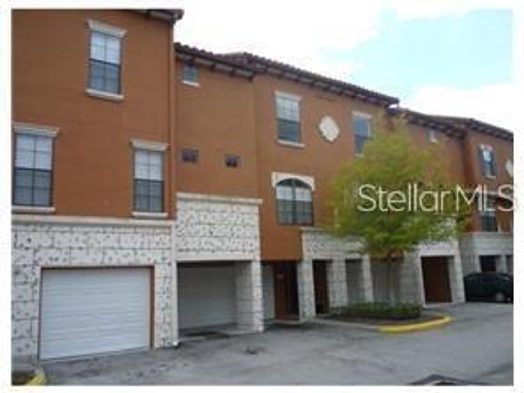 Photo of 6117 Metrowest Boulevard #103, Orlando, FL 32835 (MLS # O6424458)