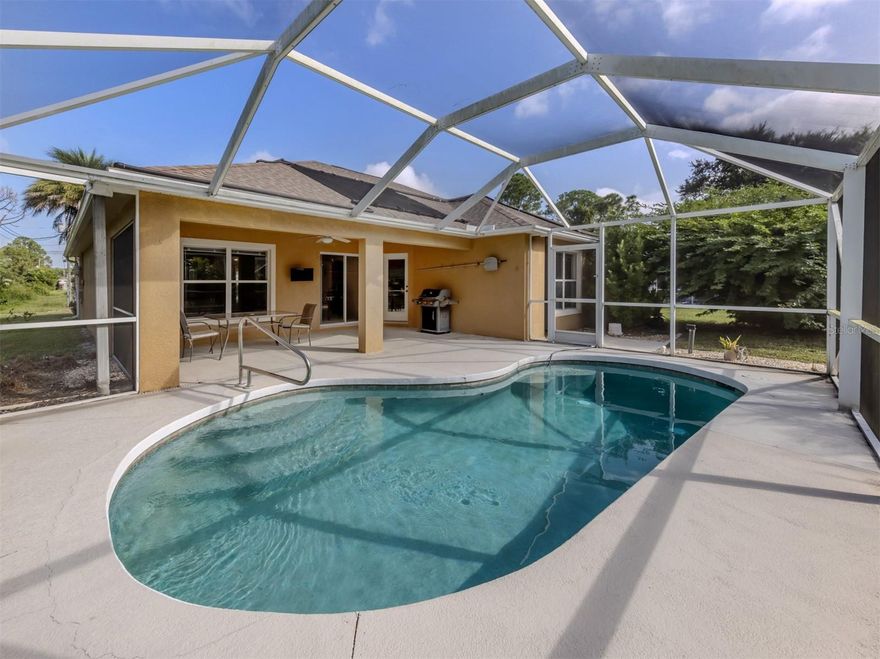 Welcome home to this 3 bedroom, 2 bath POOL home on a private lot in Sunny North Port, Florida. No HOA dues, NOT n a flood zone. 
Home has a 2023 roof. Split bedroom floorplan, two large living areas, separate dining area and counter dining. Large Primary suite overlooks pool  area, has two closets, en suite bathroom with dual vanity and soaker tub and separate shower. There is a Large laundry room with utility tub, tons of storage and closet space throughout the home. Additional pantry and private office area behind kitchen. Pool area has large covered area and the backyard is oh so private and feels like your own little oasis!  This home has so many great feature and great potential with its large and bright floorplan and convenient location.