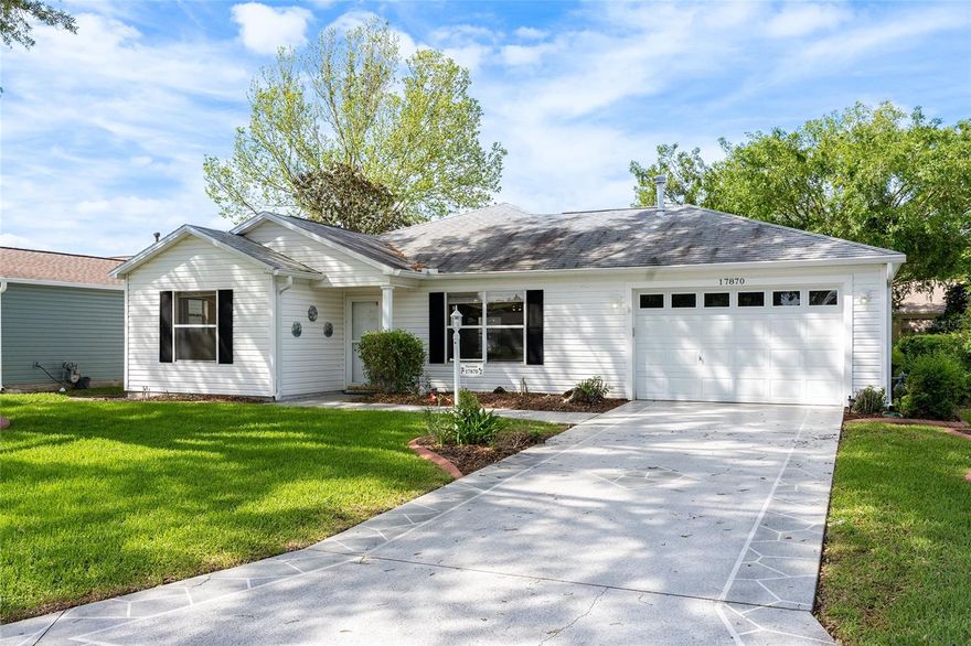 Village of Springdale, this Austin Ranch Home built in 2001 has 2 Bedrooms/2 Baths, 1-Car Garage with Golf Cart Parking, Spacious Enclosed 240sq ft Florida Room, and a 13Ft x 17Ft Painted Patio for sitting outside and enjoying the Florida Lifestyle!! Inside, you’ll find VAULTED Ceilings in Main Living Area, NEW Carpet in Bedrooms, Tile Floors Throughout the rest of the home. GAS HOME!! ROOF: 09/2021, HVAC: 2015 (14 Seer Split System), GAS WATER HEATER: 04/2018. OPEN FLOORPLAN! -- The Living Room has a Ceiling Fan with Light, Vaulted Ceiling and Window to Front Yard. The Dining Room has a Ceiling Fan with Light and Glass Slider to Enclosed Florida Room. In the Kitchen, you’ll find a SOLAR TUBE, Tile Topped Counters with Tiled Backsplash & Breakfast Bar Overhang, Cabinets with Knobs, Pot Drawers, Window over Sink to Florida Room and Door to Garage. The SPACIOUS Primary Bedroom is 15ft x 14.5ft with En-Suite Bathroom, and has NEW CARPET, a Ceiling Fan with Light, Window to Backyard, Sliding Glass Door to Enclosed Florida Room, and a Walk-in Closet with Extra Wire Shelving and Attic Access. The En-suite Bathroom has Tile Flooring, Large Vanity with Single Sink, Private Privy with Frosted Window to Side Yard, Step-in Shower with Handheld Sprayer & Linen Closet. The Guest Bath has a SOLAR TUBE, Tub/Shower Combo, Exhaust Fan, and Vanity with Makeup Area. Bedroom 2 has NEW CARPET, Window to Front & Side Yard, and an Oversized Closet. The Florida Room is 19.5Ft x 11.5Ft with Acrylic Slider Windows and Roll-down Blinds, Ceiling Fan with Light, Door to Painted Patio, and Glass Slider Doors to Owner’s Suite and into Dining Area. The Garage is a 1 Car Garage with Golf Cart Parking and has a Utility Sink, Irrigation System, Pull-down Attic Stairs, Washer & Dryer, Window & Door to Backyard, Bumper Pole, HVAC (Gas Furnace) with Clean-out Pipe, Gas Water Heater. LOW BOND BALANCE: $1,689.12. Unit 47 Bond Assessment: $375.29/yr. Unit 47 CDD Maintenance: $1,010.18/yr. Marion County Waste, Stormwater & Fire: $513.97/yr. Buyer responsible to verify all information and measurements. Don’t Miss out on This Lovely Home in a great location!