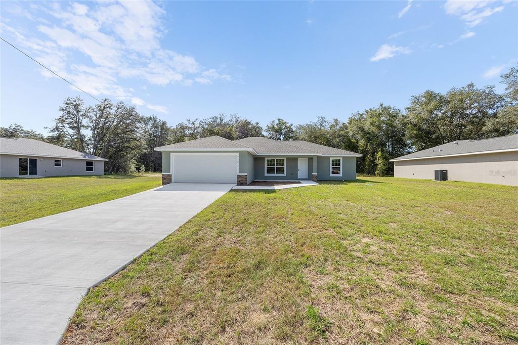 Photo of 5676 N Summerfield Point, Citrus Springs, FL 34434 (MLS # OM718053)