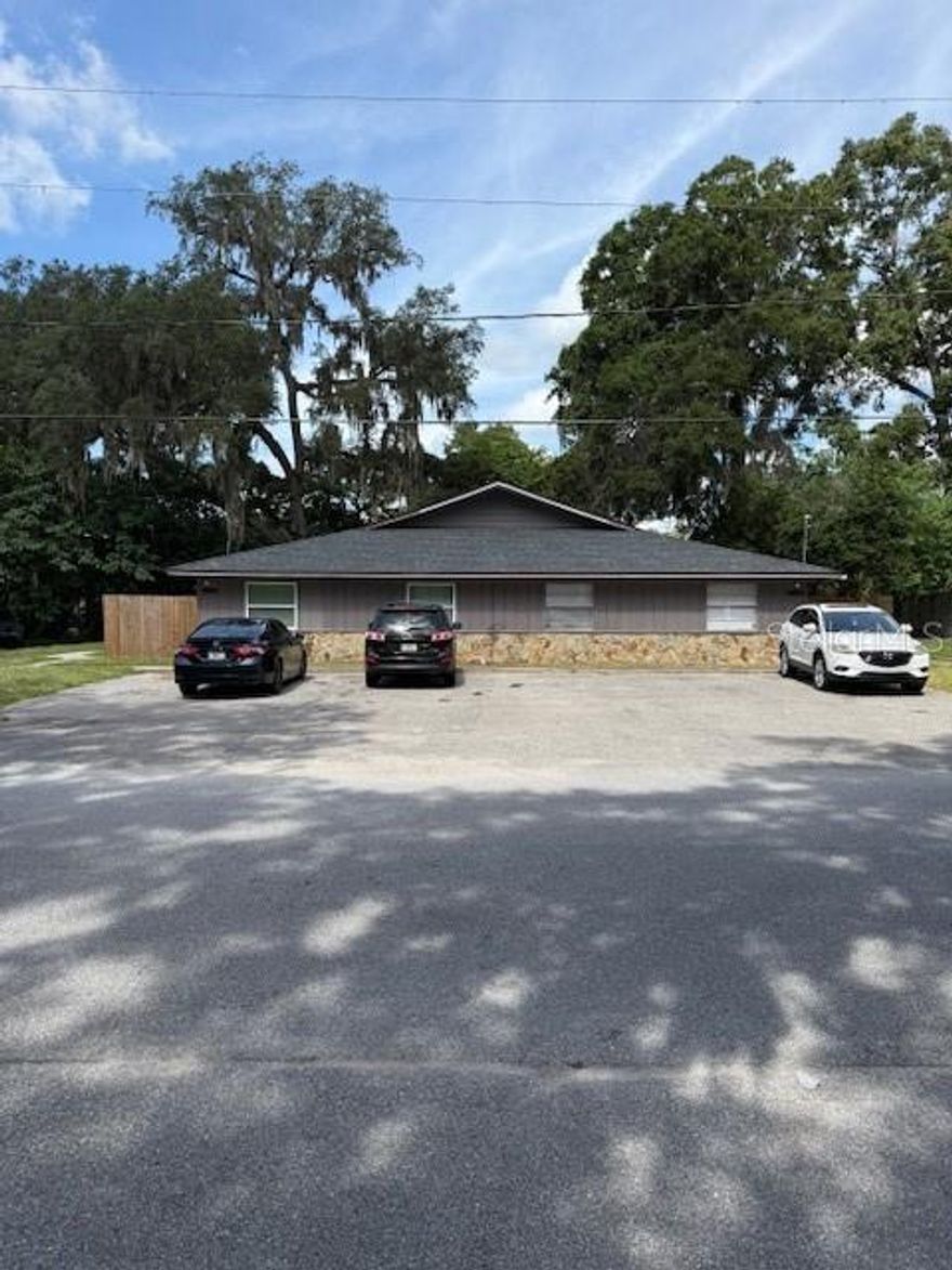 **PRICE REDUCED**Opportunity Awaits** Calling All Investor's** This True 4-plex is an amazing investment property.. Centrally located in the heart of Ocala this property sits in the Citrus Park subdivision; a quiet community just south of Downtown Ocala. It is a true turnkey Gem grossing a whopping 9% annual Cap rate with plenty of room to grow. All 4 units are rented with great tenant's and the property is currently bringing in $5,050.00 a month and $60,600.00 annually.. There are a few long term tenants, which is alway great to have and all tenants pay on time.. The Owner has spared no expenses towards upgrading the property, Upgrades include a new Roof in 2023, 4 bathrooms were totally upgraded including new shower fixture controller's, sinks faucets and mirrors.. 2 new kitchen's with shaker cabinet's, counters and sink's plus new plumbing and P-traps in the 2 upgraded kitchen's. Also the owner put in new privacy fences and fresh paint.. All four unit's have there own privacy fence and dividers giving your tenant's a homie feel. Also each unit has it's own washer/dryer hook-up's; each tenant provide's there own W/D. All units have been well maintained by the landlord there are currently no repairs needed..  Don't miss out on this opportunity to add this Amazing property to your porfolio call now...