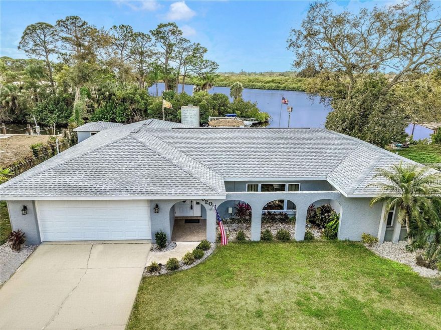 Florida waterfront living on BEAUTIFUL Braden River that opens to the Bay and Gulf of America. Meticulously maintained block home with split floor plan 3-bedroom, 2-bath is water-front on the peaceful brackish salt water of the Braden River. See the dolphin? Quick boating access to Terra Ceia Bay, Tampa Bay, the Intracoastal Waterway and the Gulf of America. 59-foot Trex dock and 13,000 lb boat lift (boats sold separately) and a dedicated launch area for kayaks and jet skis. Waterside tiki bar has electric and running water.  ceramic plank tile in Living Room, Dining Room, Kitchen and Family Room. Bedrooms have new carpet and pad March 2026. The Kitchen has solid wood cabinets with under cabinet lights and switches built into the tile backsplash,  quartz countertops, and a pass-through bar. The living room has a large picture window and the dining room has sliding glass doors that open to a screened lanai for water views and sunsets. NEW ROOF 2023, new windows and polycarbonate (light weight and strong) hurricane shutters. Located on CUL-DE-SAC. Fully fenced backyard, a 10x10 detached workshop, space for RV and boat trailer parking. Convenient to I-75, shopping, dining, and the UTC area, this move-in-ready waterfront property with furnishings that are negotiable. NO HOA. ROOM FOR A POOL. This home has been meticulously maintained. No history of hurricane damage. Owner is Motivated.