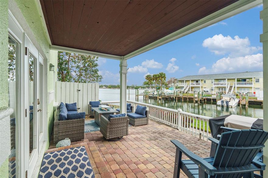 Discover true waterfront living in this charming 2-bed, 2-bath GROUND END unit featuring two patios. This turnkey fully renovated unit offers a fresh canvas for your personal vision—whether you're dreaming of a full-time Florida home, a sunny winter escape, or a high-demand rental opportunity. Enjoy a maintenance-free lifestyle with amenities that feel like a private resort: two heated pools and spas, newly updated fitness centers, tennis and pickleball courts, kayak storage, and tranquil walking paths along Old Tampa Bay. The community’s clubhouse features a library, private bar, and a two-story tropical lounge, while a private fishing pier invites anglers to relax bayside. All of this is tucked just minutes from vibrant Downtown St. Pete. With 24-hour gated security and golf-cart patrols, you can unwind with peace of mind. Come tour this serene waterfront enclave and imagine the possibilities in your new Florida retreat.
