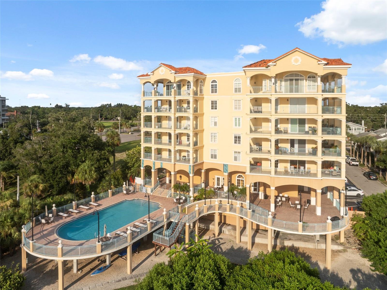Enjoy stunning sunrises and sunsets from this beautifully fully furnished 2 bed, 2 bath + bonus room condo in the upscale Bayview building. With over 1,500 sq ft, this spacious split-plan unit features a modern kitchen with granite counters and stainless steel appliances, open living/dining area, and a private balcony overlooking Clearwater Harbor. Built in 2004, Bayview offers resort-style amenities: heated pool, fitness center, clubhouse, sun deck with grills, storage unit, and 2 under-building parking spaces. Pet-friendly with restrictions. Turnkey and move-in ready—your Florida paradise awaits!