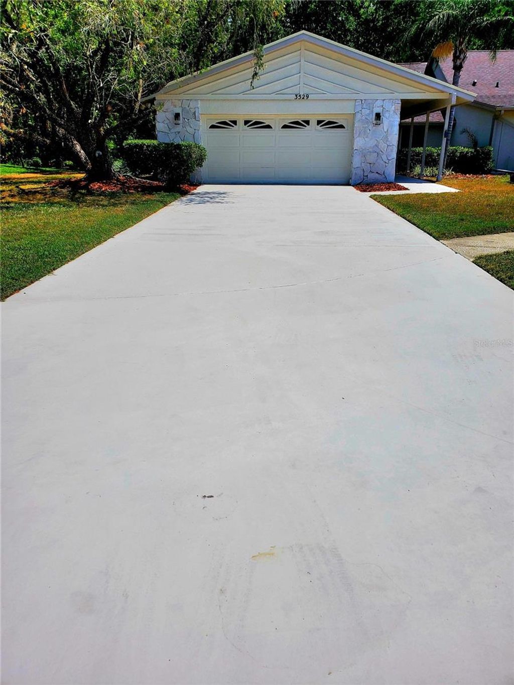 Photo of 3529 Tanglewood Trail, Palm Harbor, FL 34685 (MLS # TB8489948)