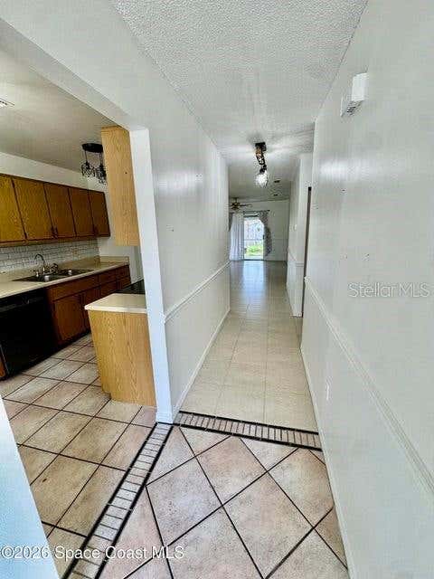 Photo of 1220 Cheney Highway #D, Titusville, FL 32780 (MLS # O6427931)