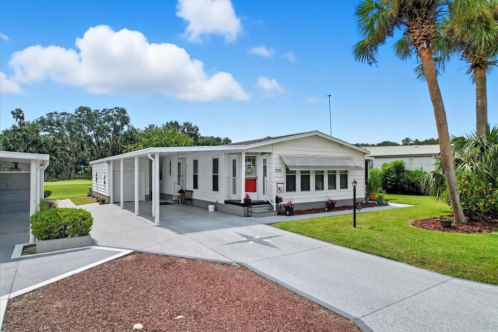 Photo of 720 Orchid Street, Lady Lake, FL 32159 (MLS # G5111099)