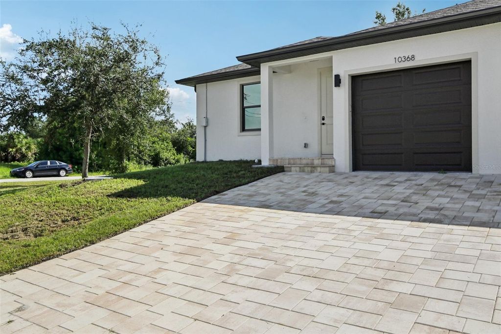 Photo of 10368 Port Everglades Street, Port Charlotte, FL 33981 (MLS # A4664550)