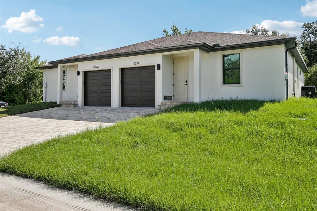 Photo of 10368 Port Everglades Street, Port Charlotte, FL 33981 (MLS # A4664550)