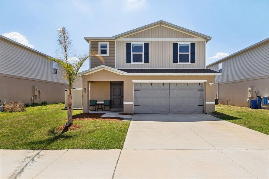 Skip the builder delays and potential inflation hikes, here is your chance to own a sought-after Lynford model that is just two years old, and comes out swinging with upgrades that make brand-new homes feel bare by comparison. Unlike waiting on new construction, this one is move-in ready and already has the extras in place that make daily living better from the start. It still delivers the rare bonus of newer construction but with the costly add-ons already done for you. From the owned whole-house water softener and fully fenced back yard to the gazebo-covered outdoor space and paved BBQ area. The insulated garage door with portable-vented AC setup gives you extra elbow-room for in in-house gym or flex space. And if you want to be one of the “cool” houses on the block the home is already wired with Govee outdoor lighting. This home offers the kind of value buyers feel after closing, not just on showing day. Inside, the layout just works. The main living area is open and easy, with the kitchen, dining, and living spaces flowing together in a way that makes everyday life comfortable. The kitchen is finished with granite countertops and stainless steel appliances. All three bedrooms are upstairs, including a spacious primary suite with dual sinks, a walk-in closet, and private bath. Located in Sumter Villas, this low-HOA, no-CDD community offers sidewalks, a community pool, and a location that keeps you close to everyday conveniences, dining, entertainment, and all the activity of The Villages. Tampa and Orlando are also only an hour away. This one gives you the feel of newer construction without the wait, without the upgrade list hanging over your head, and without starting from scratch after closing.