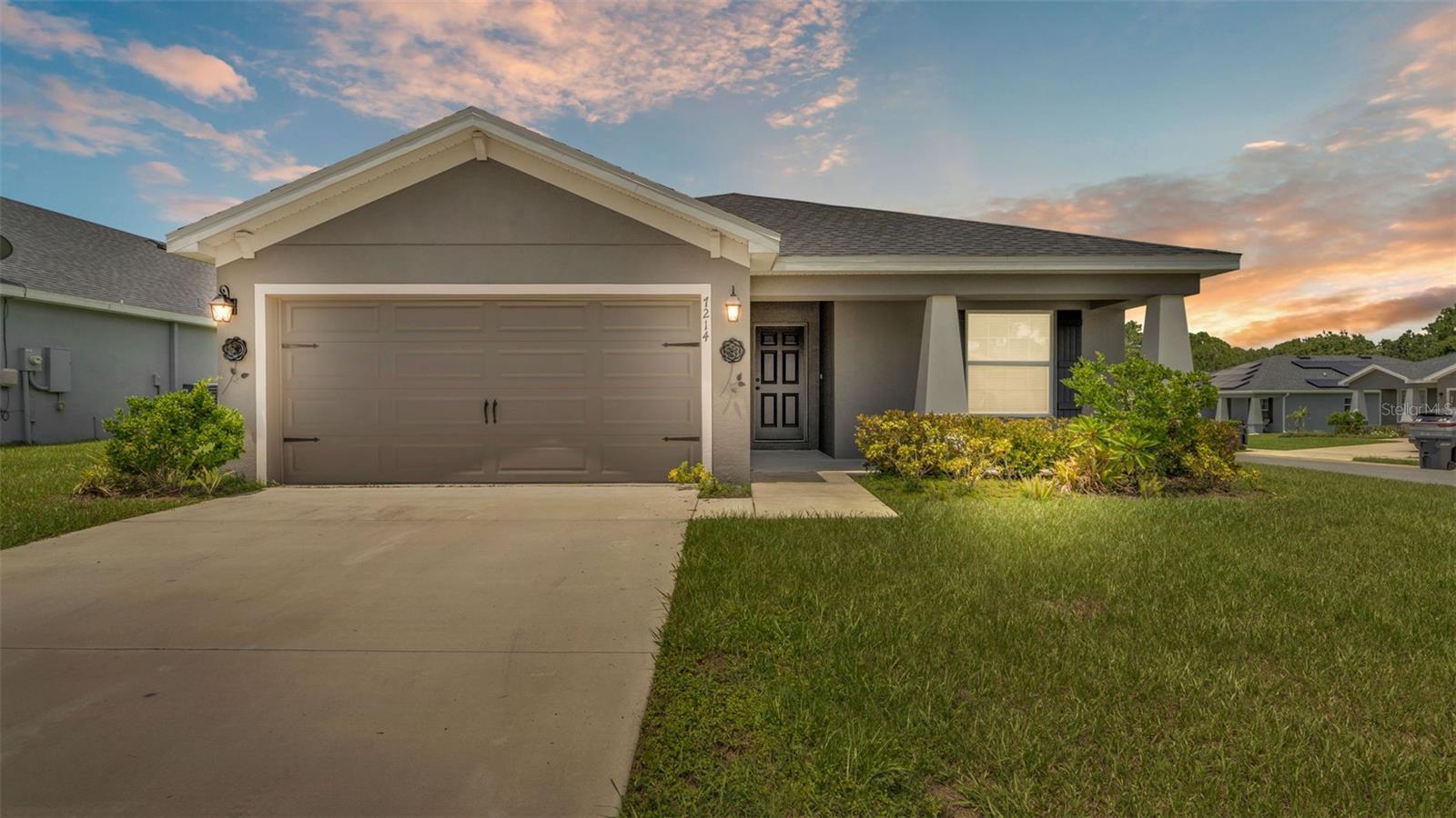 This 4 bedroom, 2 bath beauty in Lakeland’s gated Hunters Crossing community blends modern style with everyday comfort and is move in ready. The kitchen is a showstopper — an oversized island perfect for gatherings, granite-look counters, stainless steel appliances (including a smart fridge), and pendant lighting that adds just the right touch of charm. This home also features a phenomenal walk in pantry and a convenient drop zone in the laundry room that also includes a washer & dryer for an added move-in ready bonus.
Your owner’s suite is a true retreat with a walk-in closet, a bold yet calming blue accent wall, and a double vanity with marble-look counters.
Enjoy mornings on the screened-in lanai, on your spacious corner lot, and the security of a gated neighborhood.
All this, plus you’re just minutes from shopping, dining, and I-4 for an easy commute to Tampa or Orlando.