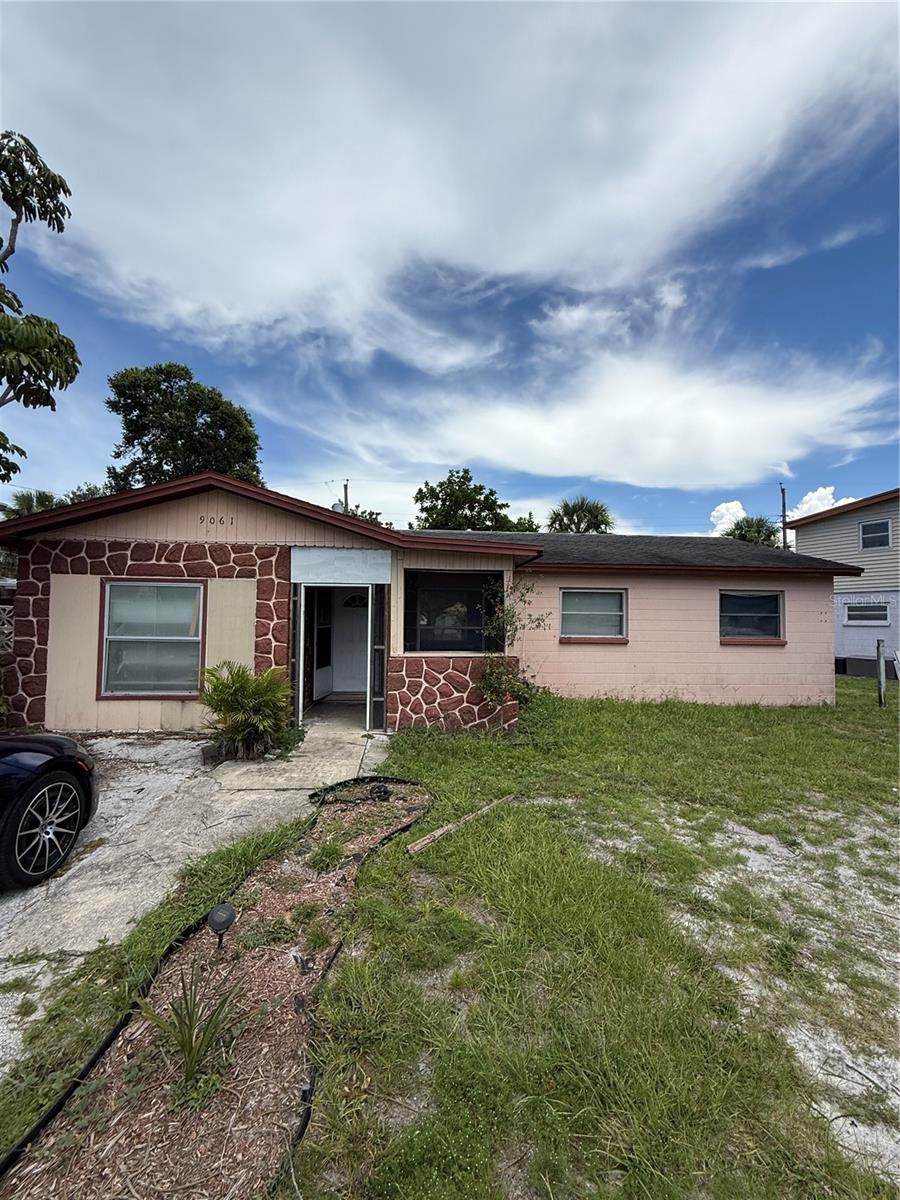 This 3 Bedroom, 2-bath block home offers a rare opportunity for investors and savvy buyers seeking a project with upside potential. With 1,266 square feet of heated living space, this property is primed for transformation, whether as a starter home, income-generating rental, or long-term investment. The interior features tile flooring throughout, and the layout provides a solid foundation to customize the space to your taste. Located just minutes from major shopping centers, Publix, Starbucks, entertainment options, & Bardmoor Golf & Tennis club, the neighborhood offers excellent lifestyle convenience and rental appeal. Opportunities like this don’t come often, bring your vision and schedule your private showing today.