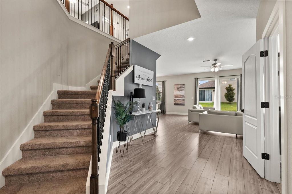 Photo of 1409 Bellamy Drive, Reunion, FL 34747 (MLS # O6367776)