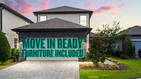 Photo of 1409 Bellamy Drive, Reunion, FL 34747 (MLS # O6367776)