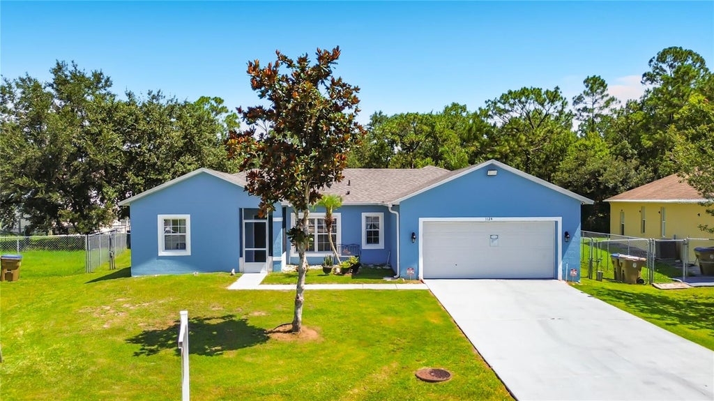Photo of 1124 Dartford Drive, Kissimmee, FL 34758 (MLS # O6418698)
