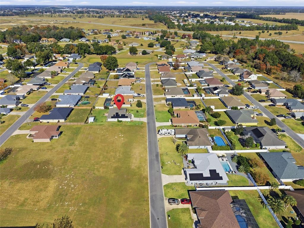 Photo of 10180 SE 69th Avenue, Belleview, FL 34420 (MLS # OM715502)