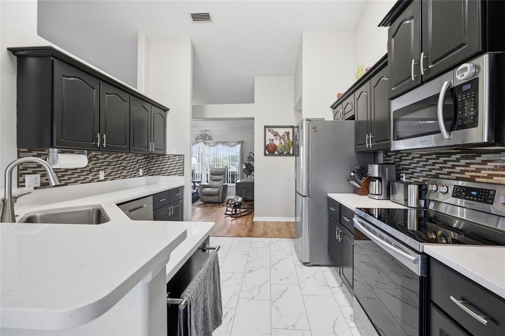 Photo of 10180 SE 69th Avenue, Belleview, FL 34420 (MLS # OM715502)