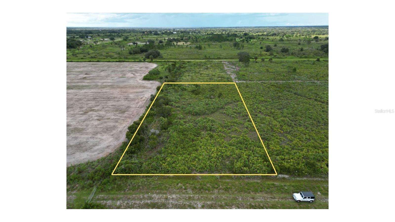 +/- 1.25 acres - high and dry flood zone X, no wetlands. This lot is great for building, recreation, or long-term investment. I also have the parcel North of this one listed for sale, 2.5 acres if both were purchased and access from 266th st and 268th St. Enjoy the freedom of rural living with plenty of space for your home, barn, garden, and recreational toys. This area is zoned for manufactured homes and site built homes. All measurements are approximate.