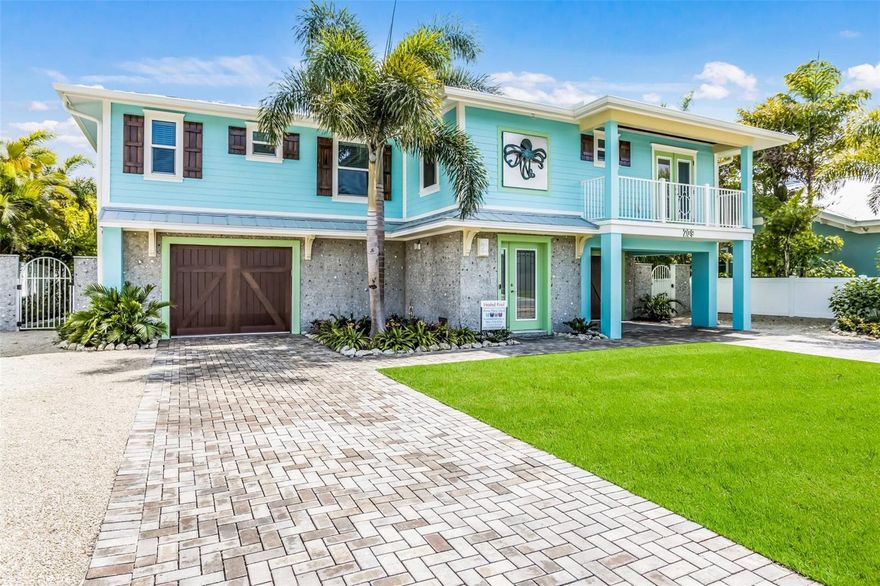 Welcome to Octopus Cottage, a stunning 4 bedroom/4.5 bath home, ideally situated just one and a half blocks from the pristine Gulf shores of Anna Maria Island. Embrace the epitome of coastal living with this meticulously designed home boasting an open floor plan, perfect for hosting memorable gatherings.
Step into the expansive kitchen, outfitted with top-of-the-line stainless-steel appliances, where culinary delights are effortlessly prepared. Adjacent to the kitchen, a beverage bar awaits, complete with a wine cooler, catering to every hosting need. As your loved ones gather around the elegant eight-top dining table beneath a captivating seashell chandelier, indulge in the joy of shared meals and laughter.
Discover unparalleled comfort in the four bedrooms, each offering luxurious ensuite baths. The main master suite beckons with its lavish ensuite bath featuring a separate tub and shower, double sink vanity adorned with artistically framed mirrors, and a spacious walk-in closet. French doors lead to the balcony, offering a serene retreat to unwind and soak in the island ambiance.
Outside, a heated pool awaits, featuring a swim-up table and a rejuvenating hot tub. The poolside oasis beckons with an oversized covered lounge area, complete with a lively bar, dart board, ping pong table, cornhole, firepit, and a large outdoor TV, ensuring endless entertainment for all.
Ascend to the balcony, where a wet bar with a built-in grill awaits, promising unforgettable al fresco dining experiences against the backdrop of breathtaking sunsets. Immerse yourself in the refreshing beach-chic décor that permeates every corner, highlighted by custom art, furnishings, and fixtures, including a charming driftwood banister and a mesmerizing glass bubble chandelier.  This home is being sold turnkey furnished.
Experience the convenience of exploring Anna Maria Island's enchanting charms with ease, thanks to the Island Trolley accessible from nearby stops. Indulge in the myriad of culinary delights, boutique shops, and marinas scattered across the island, promising endless adventures for all ages.  Whether seeking a family beach retreat or an investment property with lucrative rental potential, Octopus Cottage embodies the essence of island living at its finest. Don't miss the opportunity to make this exquisite haven yours. Schedule an appointment today to witness the unparalleled beauty of this coastal gem.