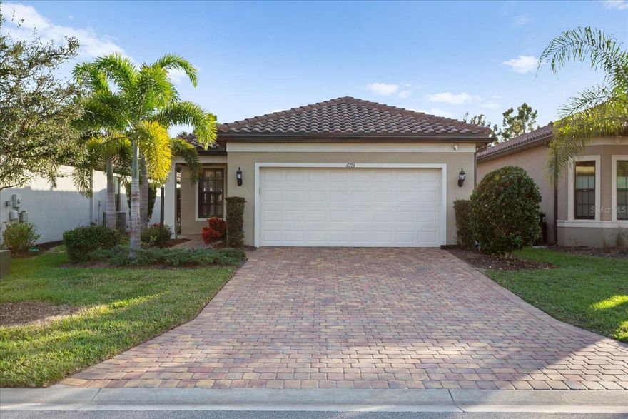 Skip the wait to build and move right into this beautifully upgraded,
move-in ready, 1,695 sq. ft. Pulte Contour Model, ideally situated in the
highly sought-after Del Webb 55+ community of Lakewood Ranch, part
of the nation’s #1 multi-generational master-planned community. Filled
with abundant natural light, this inviting home offers a bright, open
ambiance and a thoughtfully designed layout featuring 2 bedrooms, 2
bathrooms, and a versatile den---perfect for a home office, hobby
space, or guest area. One of the home’s most distinctive features is the
enclosed lanai, fully tiled and climate-controlled with air conditioning,
sliding windows with screens, and motorized blackout shades. This
exceptional space adds valuable year-round living area, making this
residence truly one-of-a-kind. The owner’s suite is a relaxing retreat,
complete with dual vanities, a spacious fully-tiled walk-in shower with
built-in bench, and a custom walk-in closet with built-ins and generous
hanging space. The kitchen is equipped with a new smooth top electric
range, 42” light cabinetry, elegant quartz countertops, and light toned
plank tile flooring create a neutral, modern aesthetic—ready to be
personalized to your taste. The instant hot water feature at the kitchen
sink adds convenience. The open-concept floor plan is ideal for both
everyday living and entertaining, seamlessly connecting the kitchen,
dining, and living areas. Additional premium systems include a water
softener, whole-home water filtration system, reverse osmosis, and
more. Designed with comfort and peace of mind, this home also
features hurricane impact glass, a whole-home generator, whole-home
surge protector, and a comprehensive alarm system with front camera
and doorbell camera. Additional thoughtful upgrades include UV A/C
sanitizer, fans in the bedrooms, dimmer switches throughout, designer
blackout shades and valances, all contributing to a refined and

comfortable living experience. This exceptional home offers the perfect
blend of style, safety, and functionality—ready to welcome you into the
Florida lifestyle you’ve been dreaming of. Schedule your private
showing today and experience firsthand the beauty, comfort, and
potential this remarkable home has to offer.