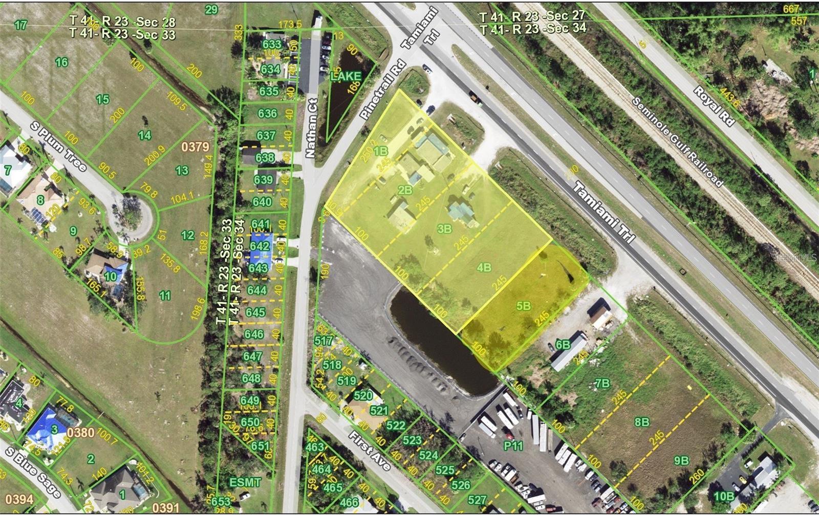 GREAT OPPORTUNITY to purchase TWO adjacent parcels with 488 feet of frontage on Tamiami Trail/ US 41. Parcel IDs 412334106001 and 412334106003 - lots 1B, 2B, 3B, 4B, 5B. Zoned CG (Commercial General). Current use for the first parcel is Multi-Family 10 units or more and current use for the second parcel is vacant commercial. The combined lot size is 2.58 acres/ 112,459 SF. Lot 5B has 100 feet on a lake in the rear of the property. Lot 4B and part of 3B also fronts the lake for another 130 feet - total 230 feet. The combined property fronts a highway with HIGH VISIBILITY. Located only 10 minutes from the Punta Gorda Airport and 10 minutes from historic downtown Punta Gorda shopping, dining, medical care, waterfront parks, boat ramps, fishing piers, walking and biking paths, art galleries, Fishermen's Village, weekend farmers and artisan markets, Charlotte Harbor Event Center, downtown events and more.