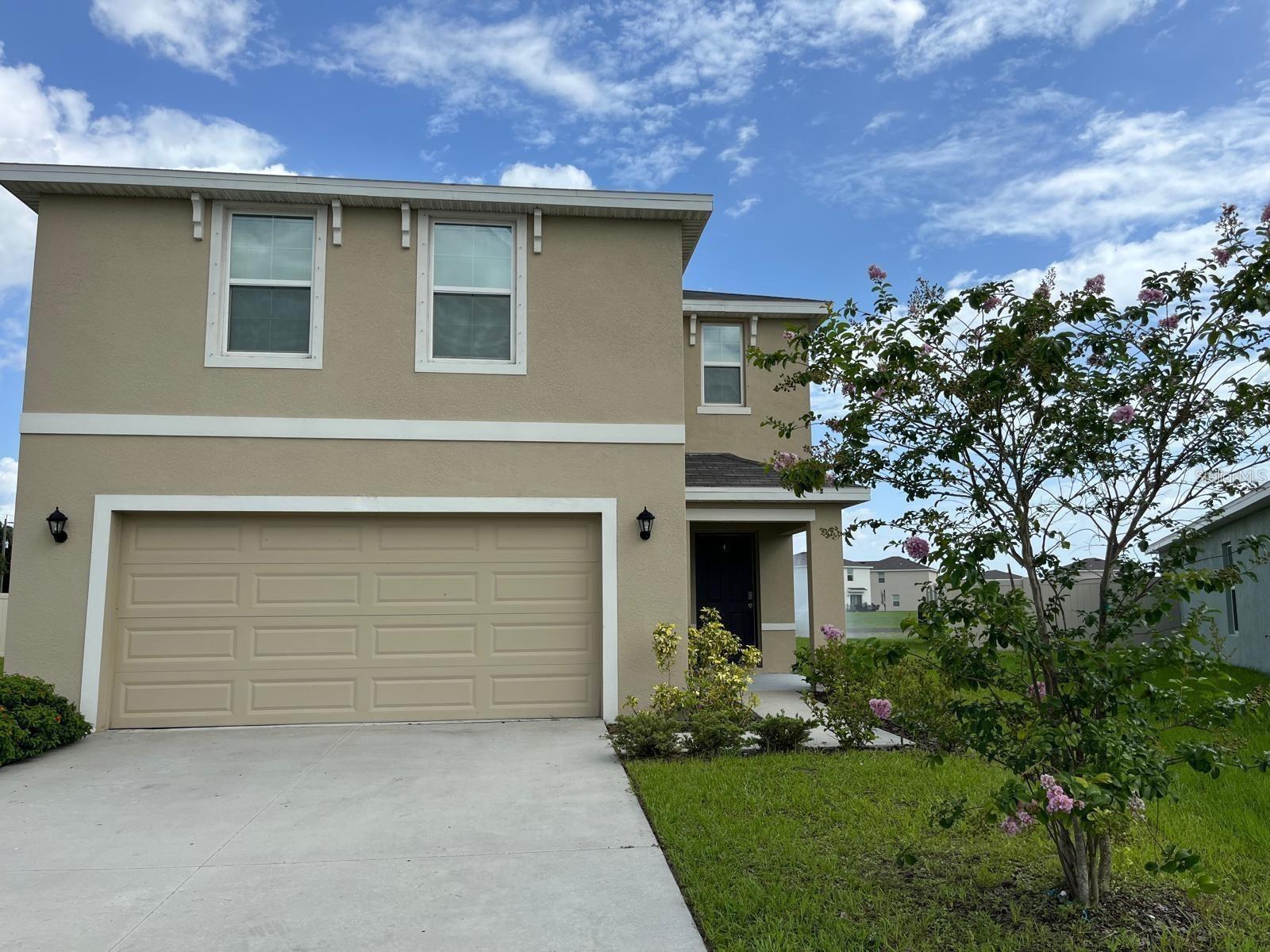 Welcome to 3842 Calamity Terrace, a spacious and move-in-ready home located in the desirable Evergreen community. Built in 2021, this concrete block construction home offers 4 large bedrooms, 2.5 bathrooms, and over 2,200 square feet of living space. The open floor plan is ideal for both entertaining and everyday living, featuring granite countertops, brand-new stainless steel appliances, and an indoor laundry room for added convenience. The home is also outfitted with smart home features such as temperature control and entertainment system with speakers throughout. The private backyard patio overlooks a serene lake with a fountain, and there’s plenty of space to add a pool and screened enclosure—making it perfect for creating your own backyard oasis. Situated on a premium cul-de-sac lot, this home also includes a two-car garage, generous closet space, and access to a beautiful community pool with pavilion and grilling area. With a low monthly HOA of just $108, this property offers both value and lifestyle. The taxes shown in the listing will also be lower if you are a resident of the home.
