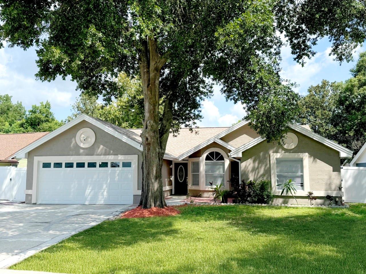 Move-In Ready Ocoee Pool Home with Modern Updates & No HOA! Tucked away on a quiet street in the heart of Ocoee, this 3-bedroom, 2-bath home with a flex room offers nearly 1,800 square feet of single-story living and is ready for immediate occupancy! From the moment you arrive, you'll appreciate the curb appeal, thanks to a freshly painted exterior and an extra-wide, extended driveway providing ample parking. Step inside to an open floor-plan with soaring vaulted ceilings and abundant natural light. The recently renovated kitchen is a showstopper, featuring wood cabinetry, granite countertops, stainless steel appliances, and a water filtration system, perfect for the home chef. A complete repipe brings peace of mind, while a brand-new roof and Hot Water Tank (2025) add lasting value. The split bedroom layout includes a spacious primary suite with sliding glass doors to the pool, a luxurious ensuite bath with a soaking tub, tiled walk-in shower, and dual vanities. The flex room offers versatility for a home office, playroom, or nursery with close proximity to the primary bedroom. Step outside to your private backyard retreat, an entertainer’s dream! The screened-in, inground pool with multi-color LED lighting is fully fenced and surrounded by a privacy fence, ideal for relaxing or hosting gatherings year-round. A newer septic pump and pool sand filter ensure efficient maintenance. Conveniently located just minutes from 429, 408, and the Florida Turnpike, this home offers easy access to everything Central Florida has to offer with NO HOA restrictions. Don’t wait...move in just in time to host the holidays with family and friends!