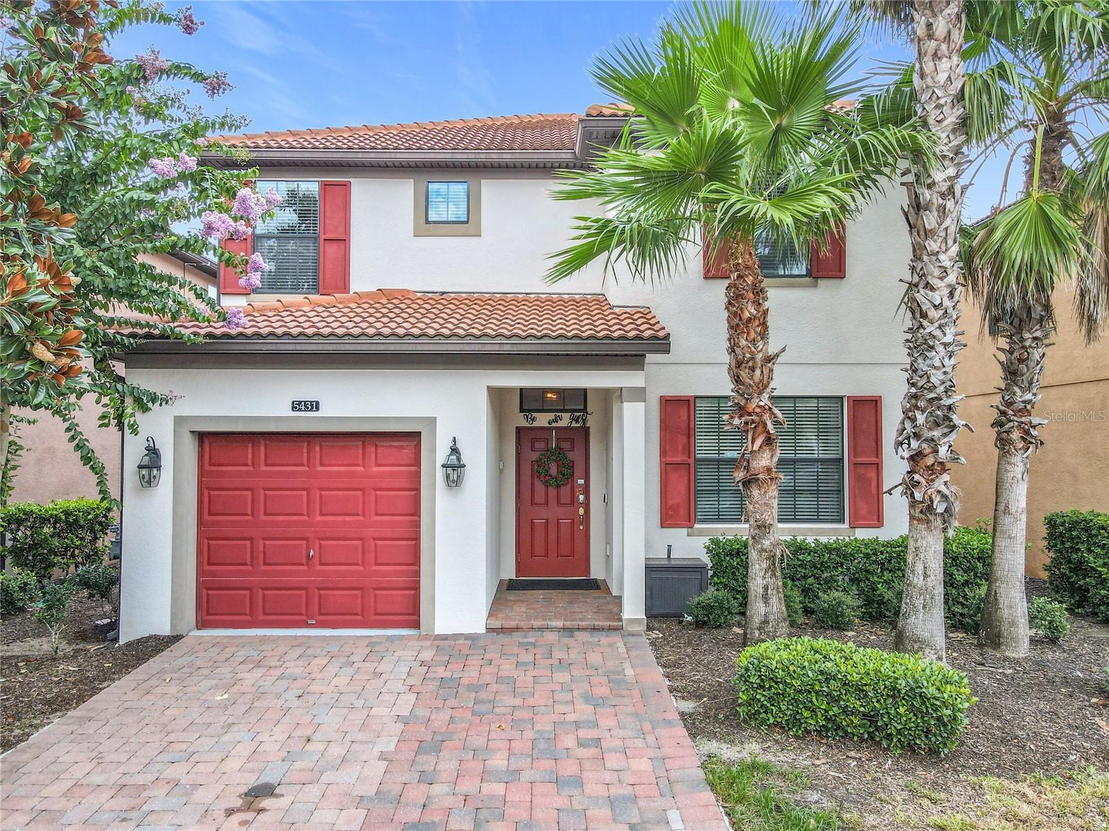 This furnished, five-bedroom, five-bathroom home in Solterra Resort represents a premier opportunity for short-term rental, second home, or vacation residence. An expansive open-concept layout showcases a bright living and dining area with vaulted ceilings, seamlessly connecting to a well-appointed kitchen with convenient adjacent laundry. Two generous main-level bedrooms include one with direct pool-deck access, ideal for effortless indoor-outdoor living. The outdoor retreat features a heated pool and spa, perfect for year-round entertaining. The garage has been transformed into a game-and-media space, adding instant guest appeal. Upstairs, a loft opens to a Star Wars–themed media room, complemented by three additional bedrooms, including Frozen- and Toy Story–inspired rooms, ensuring wide kid- and family-friendly appeal. The primary suite offers a spa-like en-suite with soaking tub and separate shower. Resort amenities at Solterra include a pool, spa, lazy river, snack bar, fitness center, and tennis and volleyball courts, elevating guest experience and value. Proximity to Orlando’s top attractions—SeaWorld, Walt Disney World, Universal Studios—plus abundant shopping and dining options, positions this property as a compelling investment with strong rental potential and lasting appeal.