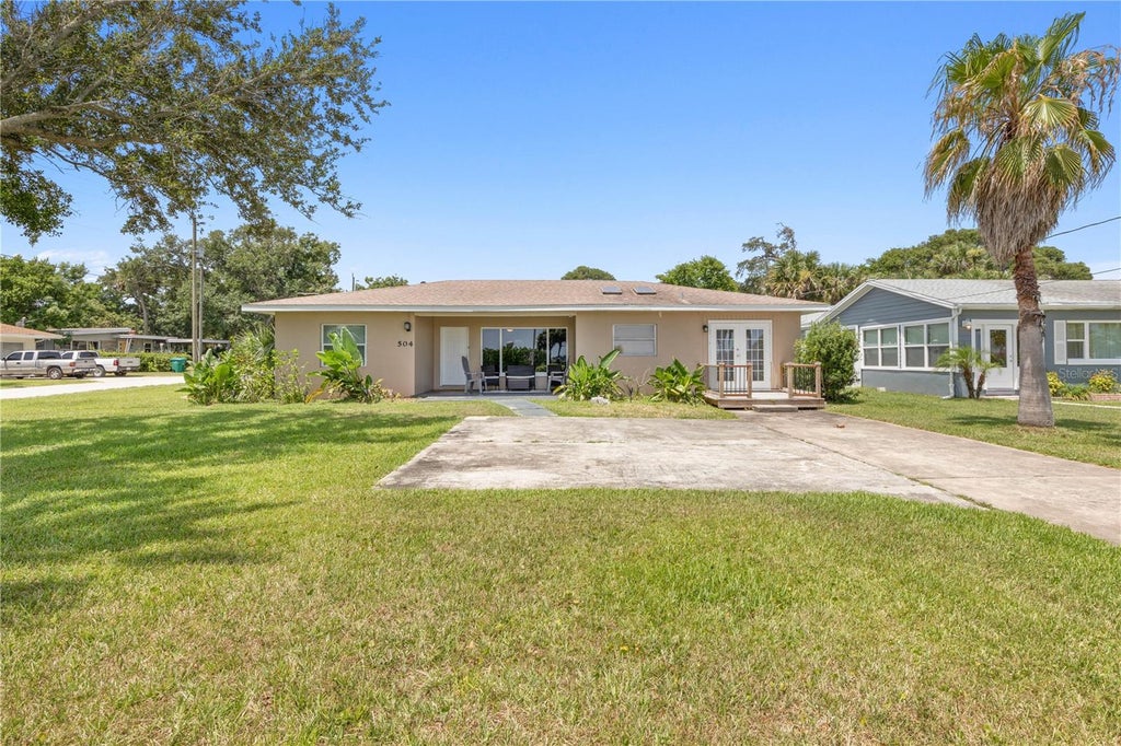 Photo of 504 Riverside Drive, Holly Hill, FL 32117 (MLS # FC320266)