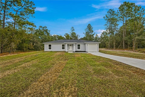 Photo of 1557 SW Seaweed Avenue, Dunnellon, FL 34431 (MLS # OM734989)