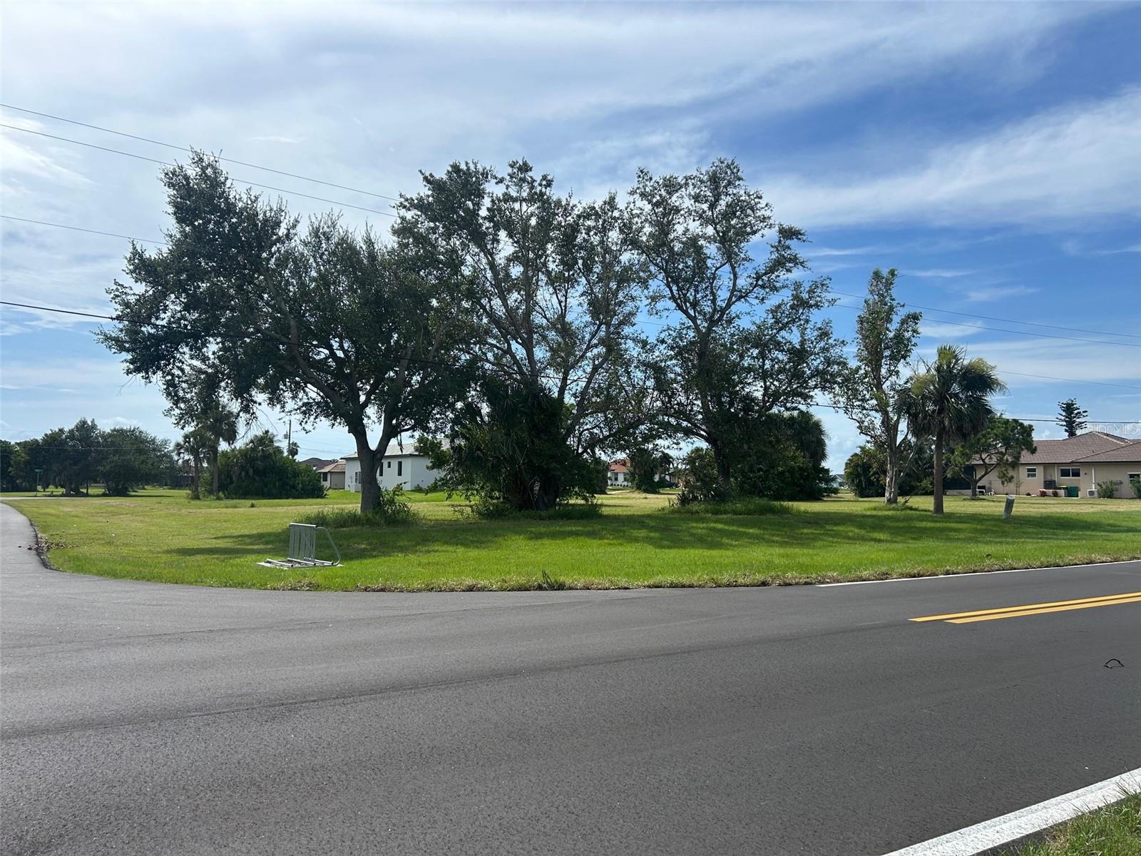 Build Your Dream in Burnt Store Lakes! Imagine designing your perfect home on this fantastic vacant corner lot in beautiful Burnt Store Lakes. With frontage on either Mapp Lane or Cape Horn Blvd, you have flexibility for your dream layout—plus the benefit of city water and sewer already in place. This welcoming community offers a park, scenic walking trails, and a kayak launch for peaceful paddles out to Charlotte Harbor. Just minutes away is Burnt Store Marina, the largest and deepest marina on Florida’s southwest coast, with quick access to Charlotte Harbor and the Gulf of Mexico. Golf enthusiasts will love the nearby public courses, including Burnt Store Marina and Coral Oaks. And when it’s time to play, shop, or dine, downtown Punta Gorda is only minutes away with its charming restaurants, boutique shops, & the ever-popular PicklePlex. Sunseeker Resort, Walmart, Publix, the Punta Gorda Airport, and top medical centers are all within a short drive. Come see how this prime lot can be the first step toward turning your dream home into a reality!