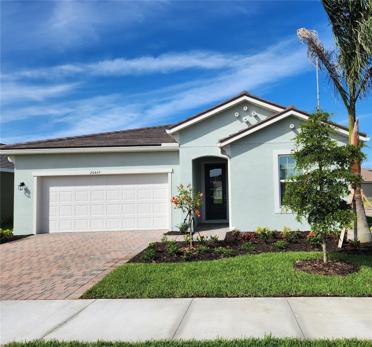 This 2-year old water front home has 3-bedroom, two bath and home features quartz countertops in the Kitchen and both bathrooms. The open floor is great for entertaining, Kitchen, Great Room and Dining Room all flow together. The primary bedroom has a large walk-in closet, split raised vanities, along with an oversized shower and is close to the fully equipped Laundry Room with Washer, Dryer and Laundry tub. The secondary bedrooms are located on the other side of the house for added privacy. Tile flooring throughout the whole home for easy upkeep! Home also has a covered lanai with a Water view, a great place for early morning coffee. Lots of privacy on the right with a large open common area. . Close to everything in Venice: CoolToday Park, where you can enjoy watching baseball games or having lunch at the tiki bar. Close to historic downtown Venice and the new Wallen Park Downtown area with Premier Shopping, Restaurants, Entertainment. Or go for a round of Golf at the many area Golf Courses. Enjoy your day at one of the many beaches, such as Venice Beach, Manasota Beach, and Englewood Beach. Amenities include, Maintenance Free Lawn care, Resort-Style Pool, Clubhouse, Fitness Center, Pickleball Courts, Tennis Courts, Tot Lot, Paw Park, Fire pit, Activity director, Gated Entries.