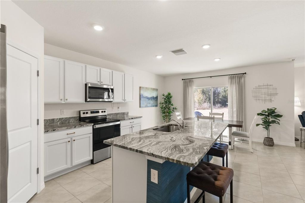 Photo of 2891 Lotus Flower Trail, Wesley Chapel, FL 33543 (MLS # TB8471261)