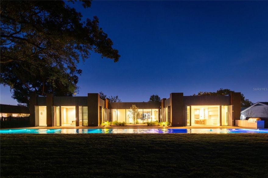 ** PARADE OF HOMES 2025 WINNER!! ** Imagine stepping into a world where ART and Architecture intertwine, where Modern Luxury isn't just a phrase, but a lived experience. Welcome to this BRAND NEW!! exceptional Orlando Florida residence, a DESIGNER Masterpiece unlike any other. This isn't just a house; it's a story waiting to be written.
The journey begins as you cross the threshold, greeted by the warm embrace of Italian hardwood flooring that flow seamlessly throughout the home. The air hums with quiet sophistication, a testament to the integrated Control4 automation system that orchestrates everything from the pool's gentle ripples to the subtle play of light and sound. You're not just entering a home; you're entering a curated environment designed for effortless living.
The heart of this home, the chef's kitchen, is a symphony of sleek design and culinary inspiration. Imagine creating culinary masterpieces amidst the clean lines of the High end Luxury Thermador appliances and the cool, smooth touch of Neolith counters. Every detail, from the Hansgrohe Axor fixtures to the award-winning Duravit toilets and the indulgent Toto Neorest in the master bath, whispers of refined elegance. The cavernous master closet, a sanctuary in itself, promises a place for every treasured possession.
But the true magic lies in the seamless integration of art and architecture. The unique black wood grain shutters, when closed, transform the house into a monolithic sculpture, a testament to visionary design. It's a feature that whispers, "This is unlike anything you've ever seen."
As the sun dips below the horizon, the outdoor oasis beckons. The almost 100-foot pool, lined with shimmering marble stones, invites you to unwind and let the day melt away. The summer kitchen stands ready to host gatherings under the stars, creating memories that will last a lifetime.
Located in the prestigious Bay Hill, home of the PGA tournament, this home places you at the epicenter of Orlando's vibrant lifestyle. World-class dining in Dr. Phillips, the magic of Disney, the thrills of Universal, and the energy of downtown Orlando are all within easy reach. Top-rated schools and renowned restaurants complete the picture, offering a lifestyle of unparalleled convenience and sophistication.
This isn't just a home; it's an opportunity to own a piece of art, a chance to live a story of unparalleled luxury. Don't let this masterpiece slip away. Contact us today to schedule your private showing and begin writing your next chapter.