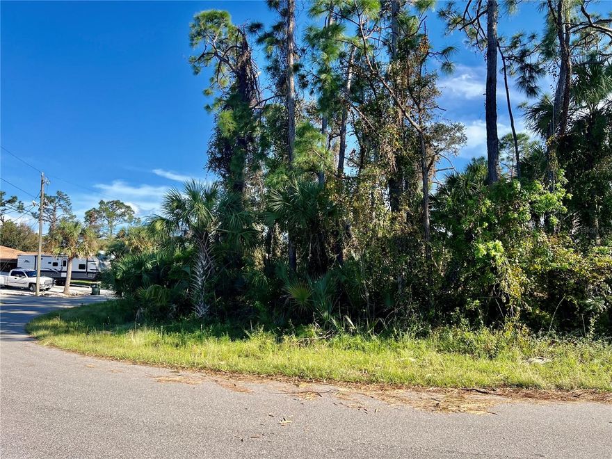 This double lot, located in North Port, on a prominent corner, offers a prime opportunity for development or building your dream home. The lot provides easy access to major conveniences, including shopping centers, dining options, and entertainment venues, making everyday errands a breeze. Situated just minutes from I-75, it's perfect for commuters, offering quick and convenient travel to nearby cities and attractions. With ample space and a desirable location, this vacant property is ideal for those seeking both accessibility and potential for future growth.