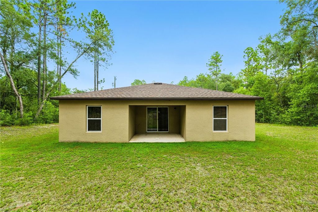 Photo of 10802 N Haitian Drive, Citrus Springs, FL 34434 (MLS # OM707869)