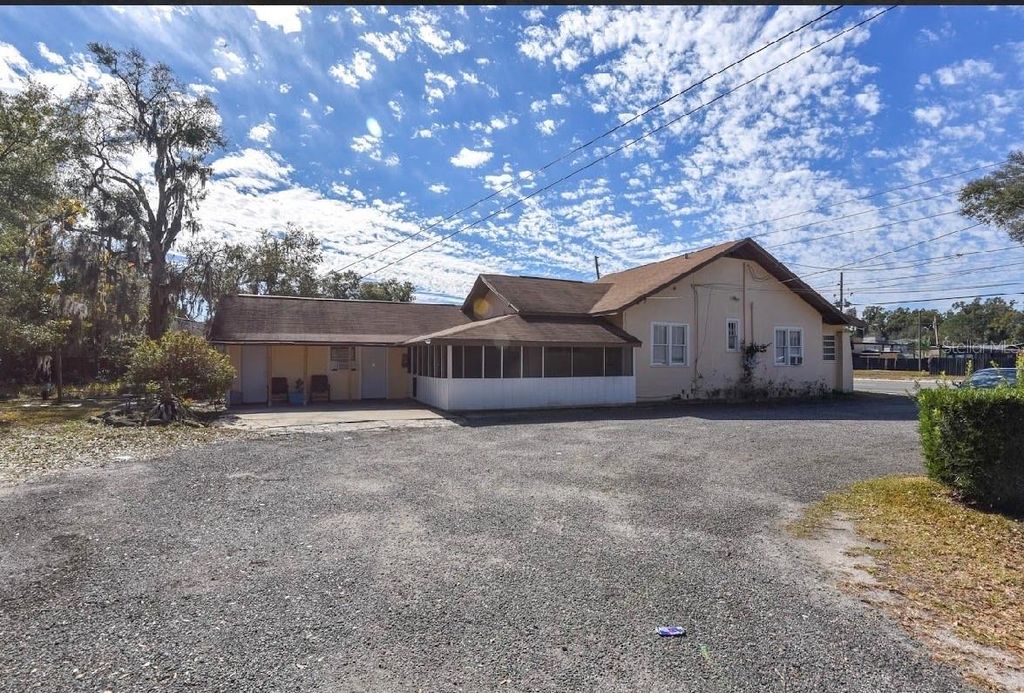 Photo of 1757 N Woodland Boulevard, Deland, FL 32720 (MLS # V4947084)
