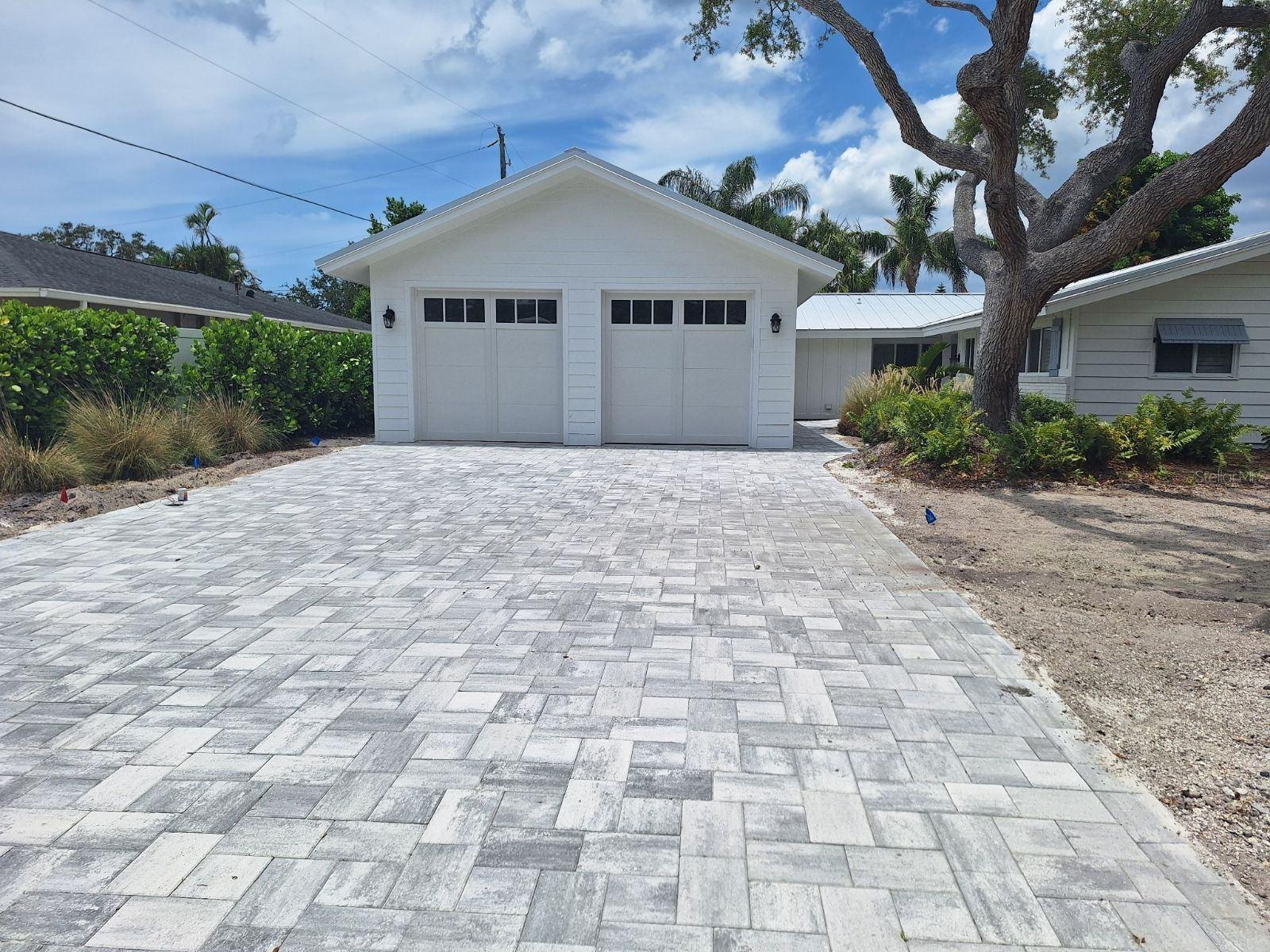 Completely renovated home with screen enclosed pool. Open Floor plan with recently updated; roof, impact windows, appliances, kitchen, bathrooms, wood flooring throughout, paint, plantation shudders, doors, gas, tankless hot water heater, landscaping, water lines, plumbing, touch kitchen faucet and so much more! Parking for a multiple vehicles, with side parking for boat, kayaks or jet skis. PRIVATE BOAT LAUNCH, in neighborhood, walking distance to South Sarasota Bay! All rooms are large and there are two master suites with en-suite bathrooms, huge walk in closets with built in shelves and Soaking Tub in Primary bedroom. Everything in this home is high end and the location is spectacular ! Neighborhood has a park with amazing sunset views and a community dock at boat launch! Located in Coral Cove, this home so close to the water yet outside the flood zone in the much sought after area, West of the trail. Boating or beaching, wining or dining you are only 2 miles from Siesta Key Beaches and even closer to many incredible restaurants for every kind of dining desired! Private boat launch directly to Sarasota Bay available with application. Detached 2 car garage. Purchase option available.