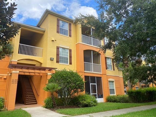 Enjoy tranquil water views from this spacious second-floor 3-bedroom, 2-bath condo, located in a gated community with a sparkling community pool. The split floor plan offers privacy and functionality, while laminate and tile flooring throughout means no carpet - just easy, low maintenance living. Water, sewer, trash and lawncare are all included! Relax on the screened balcony overlooking a beautifully landscaped pond. Ideally situated close to the airport, major highways, shopping, and restaurants, this home combines peaceful surroundings with everyday convenience. A perfect blend of comfort, security, and location - schedule your tour today!