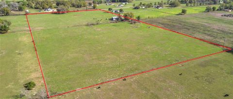 Photo of 855 NE 107th Road, Oxford, FL 34484 (MLS # TB8486454)