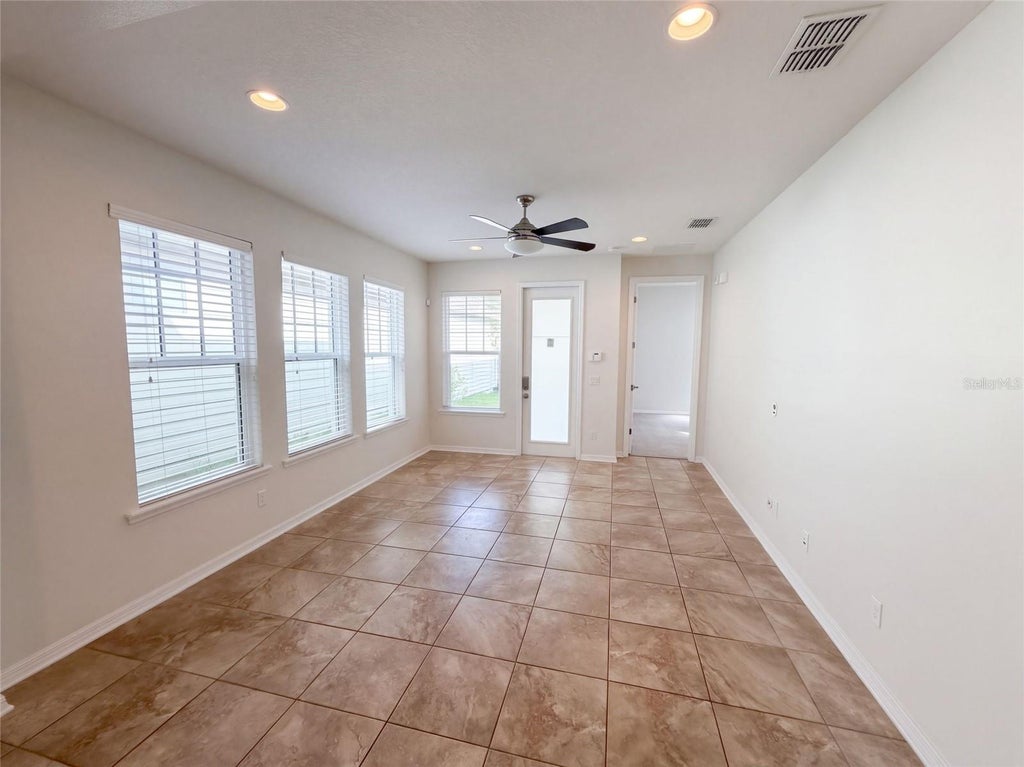 Photo of 8231 Laureate Boulevard, Orlando, FL 32827 (MLS # O6445629)