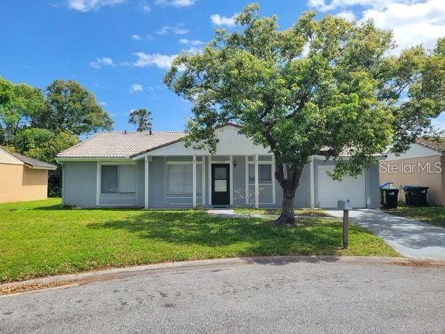 Photo of 10718 Windsor Place, Orlando, FL 32821 (MLS # O6432075)