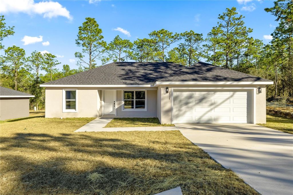 Photo of 24125 NW Foxglove Lane, Dunnellon, FL 34431 (MLS # OM718684)