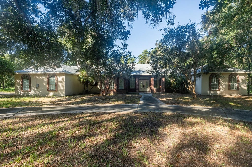 Photo of 5135 Collier Parkway, Land O Lakes, FL 34639 (MLS # TB8544947)